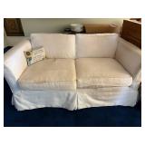 White Two-Seater Sofa with Cushions