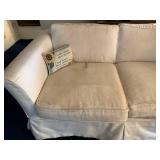 White Two-Seater Sofa with Cushions