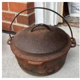 G - Two Vintage Cast-Iron Pots with Bail Handles