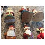 LL - Collection of 12 Hand-Carved Wooden Santa Figurines by Pobbies Crafty Crafts