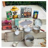 LR - Vintage Camp Cookware Collection with Cast Iron, Percolator, Lantern, and Steamer Kettle