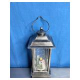 Snow Globe Lantern with a Snowman Scene Inside.
