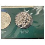 The Silver Story Collection: 1957 Silver Certificate- Excellent Condition; higher Grade 1883-? Morgan Silver Dollar; Higher Grade 1922-? Peace Dollar; and Approx. 1/2 Ounce Silver Granules