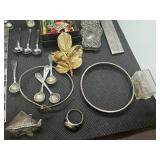 Grab Bag of Miscellaneous Jewelry, Pins, Vial of .999 Silver, 6 miniature silver spoons, ring, bracelets, other metal items