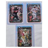 Lot of 3 Baseball Cards Featuring Elly De La Cruz, Jackson Holliday, and Jackson Merrill Rookie Cards.