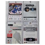 Lot of 8 Hockey Cards All in Magnetic One Touch Cases Featuring Key Players Including Leon Draisaitl, Cale Makar, and Matty Beniers