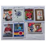 Lot of 7 Baseball Cards in Magnetic and Screw Down One Touch Cases Featuring Alfonso Soriano, Mike Trout, and Roger Clemens with Autographs and Relics.