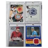 Lot of 7 Baseball Cards in Magnetic and Screw Down One Touch Cases Featuring Alfonso Soriano, Mike Trout, and Roger Clemens with Autographs and Relics.