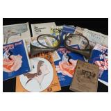 2 VINTAGE BRASS FRENCH HORNS PLUS SHEET MUSIC.