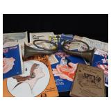 2 VINTAGE BRASS FRENCH HORNS PLUS SHEET MUSIC.