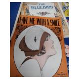 2 VINTAGE BRASS FRENCH HORNS PLUS SHEET MUSIC.