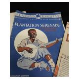 2 VINTAGE BRASS FRENCH HORNS PLUS SHEET MUSIC.