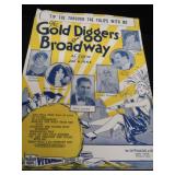 2 VINTAGE BRASS FRENCH HORNS PLUS SHEET MUSIC.