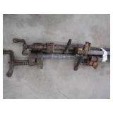 4 LONG METAL PIPE CLAMPS.