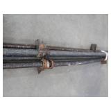 4 LONG METAL PIPE CLAMPS.