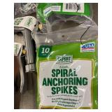 Collection of Garden Tools and Accessories Including Spiral Anchoring Spikes, Nozzles, and Light