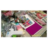 Tote full of crafting supplies.