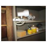 Stacked pair of metal shelving unit...