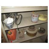 Stacked pair of metal shelving unit...