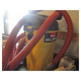 Wall Mount Shop vac with hose and o...