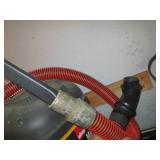 Wall Mount Shop vac with hose and o...