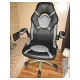 Gray and black leather style padded...