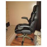 Gray and black leather style padded...