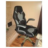 Gray and black leather style padded...