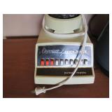 Vintage and modern blenders each wi...