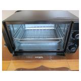 Comfee toaster oven with black fini...