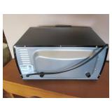 Comfee toaster oven with black fini...