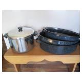 Enamelware roasters with lids in as...