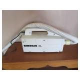 Oreck XL handheld vacuum cleaner wi...