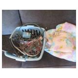 Small laundry basket of cords, cabl...