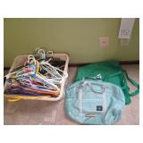 Laundry basket with plastic hangers...