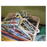 Laundry basket with plastic hangers...