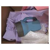 Plastic hangers, metal mixing bowls...