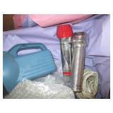 Plastic hangers, metal mixing bowls...