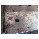 Antique sewing machine in a split w...