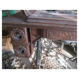 Antique sewing machine in a split w...
