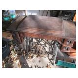 Antique sewing machine in a split w...