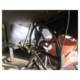 Antique sewing machine in a split w...