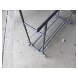 Dual rod clothing rack with rolling...