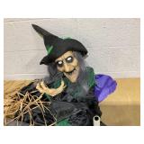 Costway Witch on Broom Halloween Animatronic Life Size Halloween Prop with LED Lights Laughing and Screaming