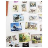Vintage World Wildlife Postage Stamp Collection with 1980-81 Stamp Catalog