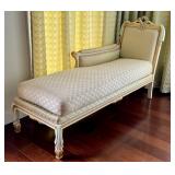 Elegant Upholstered Chaise Lounge with Carved Floral Details