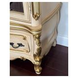 Ornate Mirrored Armoire with Gold Accents and Lower Drawer