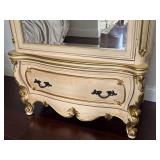 Ornate Mirrored Armoire with Gold Accents and Lower Drawer