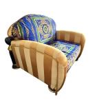 Large Patterned Armchair with Matching Ottoman and Gold Accents, Versace Fabric