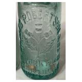 LR - Pair of Vintage 9.5 Inch Codd Glass Bottles
